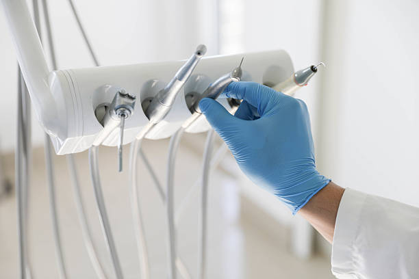 Professional Tooth Extraction technician working in Sunman, IN